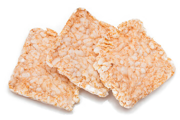 A Heap of Square Rice Cakes - Isolated on White. Dietary Crispbread - Isolation