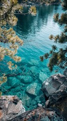 Serene lake with turquoise waters, pine trees, rocks beneath the surface. Rocky shore, lush greenery, clear sunny day enhance beauty and tranquility.