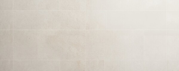 A minimalist, white tiled wall with a subtle gradient of light and dark tones, featuring a few small imperfections and a slight shadow, exudes a sense of tranquility and simplicity