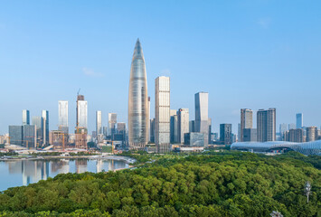 Park in city of Shenzhen China,beautiful mix of green trees combined with buildings, modern architecture © xiaoliangge