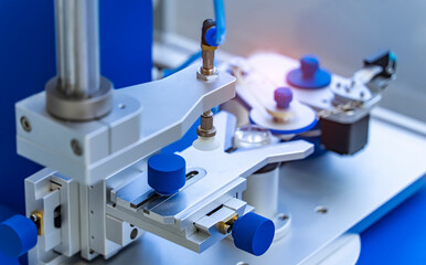 automatic optician equipment for Monitor camera lens production in workshop,Smart factory industry 4.0 concept.