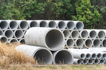Concrete drainage pipes for industrial building construction.