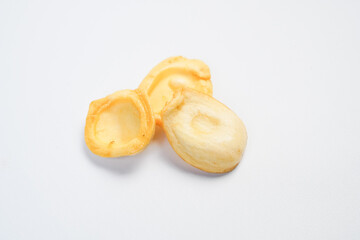 Three pieces of food are on a white background