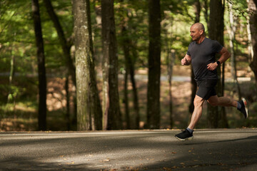 Fototapeta premium Man jogging in park