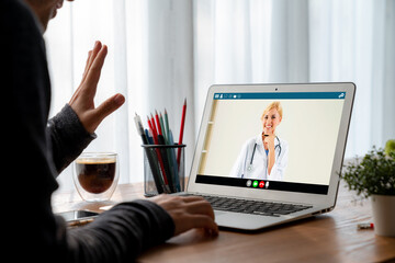 Doctor video call online by modish telemedicine software application for virtual meeting with patient