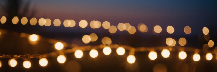Glittering bokeh lights on a cool winter background