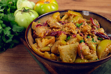 fried green tomatoes, with onions and spices, green tomato appetizer, Georgian cuisine, homemade, no people,