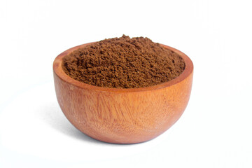 Roasted coffee powder on wooden bowl isolated on white background