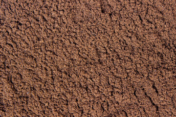 Roasted coffee powder, food background.