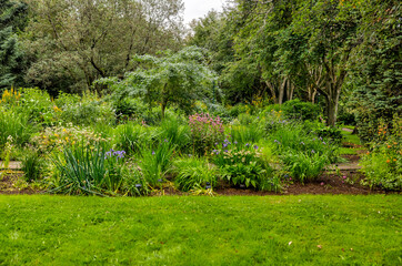 Akureyri, Iceland - August 9, 2024: Fields of flowers in the public botanical gardens of Akureyri, Iceland
