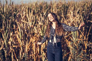 A Joyful Moment in a Beautiful Cornfield on a Bright and Sunny Day Filled with Fun and Energy