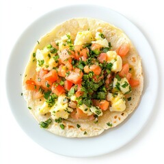 A tortilla topped with scrambled eggs, tomatoes, and cilantro, served on a white plate.