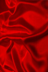 Red silk or satin luxury fabric texture can use as abstract background.