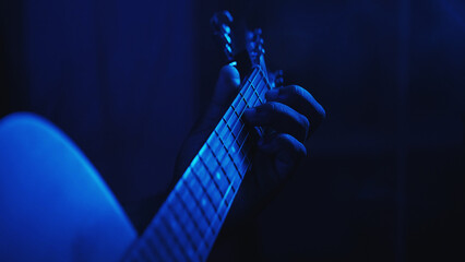 Live music. Rock festival. Acoustic show. Inspired artist man hands playing guitar song at...