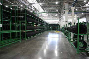Tire industry, tire production, tire warehouse, industry, metal, construction, tire factory, warehouse, tires, building, truck tires, passenger tires, tire fitting equipment, automobile tires, machine