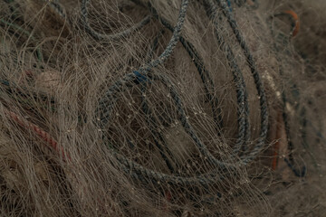 the tangled hook of a fishing net