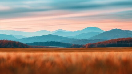 Fototapeta premium Serene Autumn Hills, a tranquil countryside scene with softly blurred distant hills, vibrant autumn colors blending seamlessly into a peaceful landscape, evoking calmness and reflection.