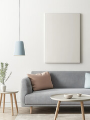 modern living room featuring light gray sofa with decorative pillows, minimalist pendant light, and round coffee table. neutral color palette creates calm and inviting atmosphere