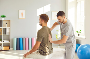 Rehabilitation and back spinal therapy by professional trainer nurse, manual therapy chiropractor,...