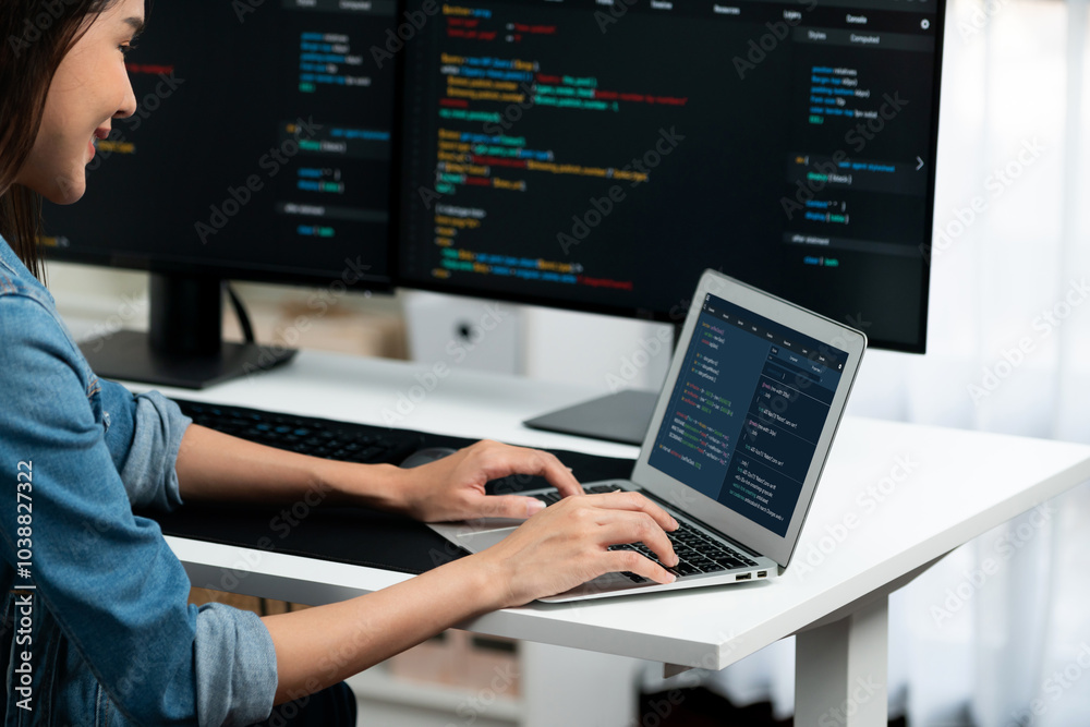 Poster smiling young asian in it developer creating with typing online information on laptop with coding pr