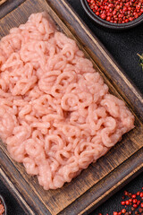 Fresh raw chicken mince with salt, spices and herbs