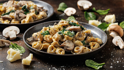 Chestnut Mushrooms and spinach tortellini served with parmesan cheese