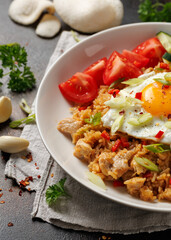 Nasi goreng, fried rice with chicken and egg in Indonesia style. Asian food