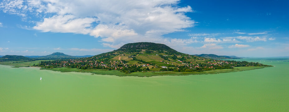 Aerial panoramic view about Badacsony is the highest mountain in the Tapolca basin, which rises on the northern shore of Lake Balaton near Badacsonytomaj.