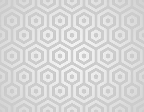 Simple and minimalistic geometric pattern composed of interlocking hexagons in varying shades of silver gray