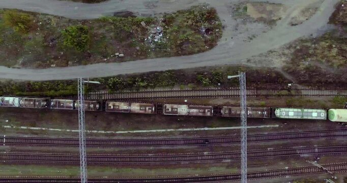Top view of a double-track freight train. Lots of railway tracks.