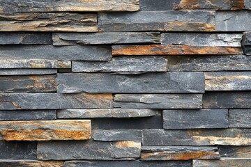 Exterior wall with striped gray and brown stone panels for texture