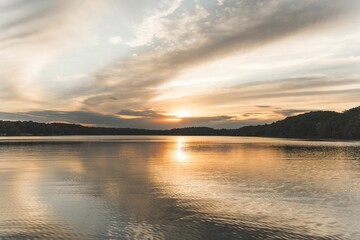 Mesmerizing sunset view of Mound lake in Minnesota in the summer with cloudy sky