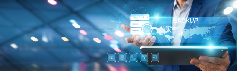 Businessman using tablet analyzing backup data recovery options, network performance metrics, software application reliability, cybersecurity threat assessments, cloud storage solutions.