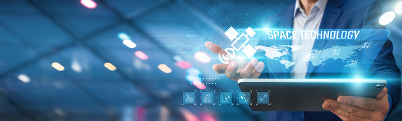 Businessman using tablet analyzing space technology trends, innovations, market potential, satellite communications, and future opportunities.