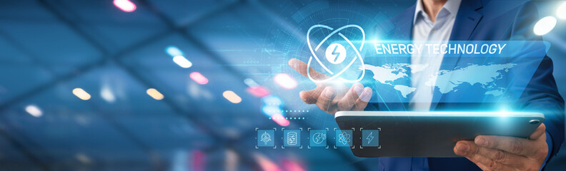 Energy technology. Businessman using tablet analyzing energy consumption data, renewable energy sources, market trends, efficiency improvements, investment opportunities, regulatory changes.