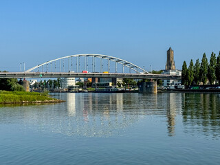 Fototapeta premium Arnhem, Netherlands - August 1, 2024: The John Frost Memorial Bridge over the Rhine River in Arnhem, Netherlands 