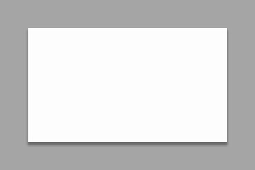 Obraz premium Blank White Template with Drop Shadow on Gray Background for Design Projects, Business Cards, or Presentations. Illustration