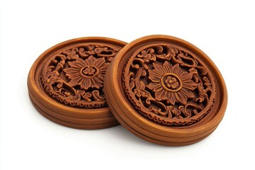 The round cake mold features two elegant oriental carvings on a white surface