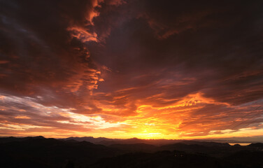 dramatic sunset with red clouds