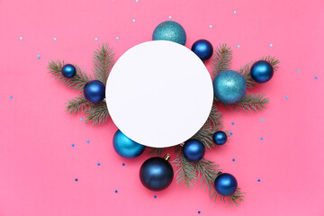 Blank card, Christmas balls, confetti and fir branches on pink background