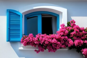 Bougainvillea vines framing a tropical window, their vibrant flowers bright against a whitewashed wall
