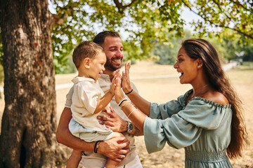 Fototapeta premium Family Playing In Nature