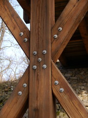 Wooden bridge beautiful structure over a ravine in the forest.