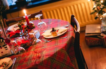 Festive Christmas Dining Table with decorations and cutlery on Christmas Morning 01