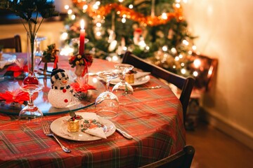 Festive Christmas Dining Table with decorations and cutlery on Christmas Morning 02