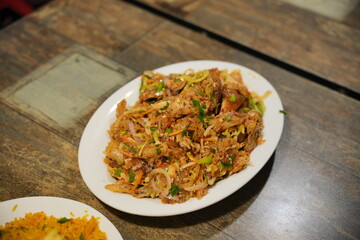 Authentic Sri Lankan Kottu Roti - A Flavorful Stir-Fry of Chopped Flatbread, Vegetables, and Spices
