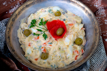 Traditional potato salad, rustic homemade mayonnaise