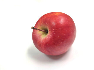Closeup view of a delicious apple fruit, isolated on white background.