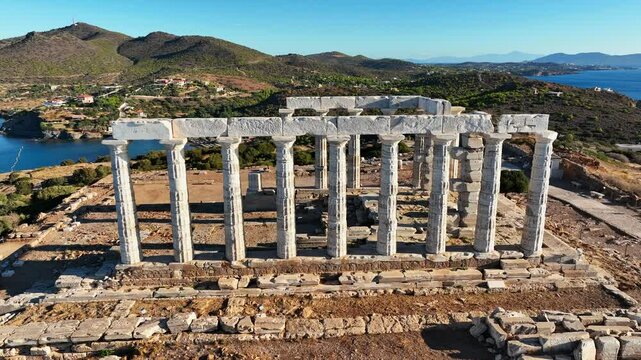 Ancient Ruins of Poseidon Greek Temple at Sunset. Aerial View of Temple of Poseidon, Magnificent Ancient Greek Temple Located on Cape Sounion in Greece