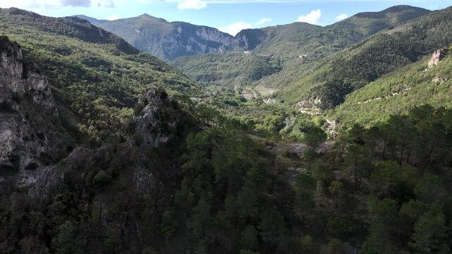 Panoramic passage over the regional parl of Gola della Rossa, Genga, near the caves of Frasassi, view of Esino river, Marche ,Italy